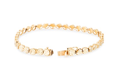 Lot 74 - A 14CT YELLOW GOLD FLEXIBLE BRACELET, stamped...