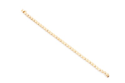 Lot 74 - A 14CT YELLOW GOLD FLEXIBLE BRACELET, stamped...