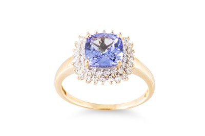 Lot 183 - A TANZANITE AND DIAMOND CLUSTER RING, the...