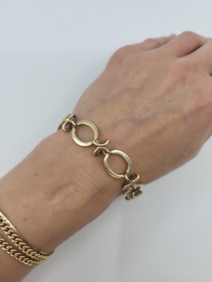 Lot 66 - A 9CT YELLOW GOLD OPEN FANCY LINK BRACELET, 19....