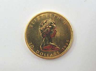 Lot 503 - A 1/4 OZ GOLD MAPLE LEAF CANADA COIN, $10 1985...