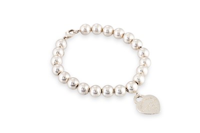 Lot 2 - A TIFFANY & CO SILVER BEADED BRACELET, with...