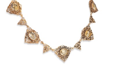 Lot 33 - AN ANTIQUE SILVER GILT NECKLACE, each wirework...