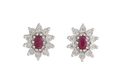Lot 27 - A PAIR OF DIAMOND AND RUBY CLUSTER EARRINGS,...