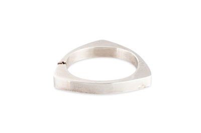 Lot 68 - A 1970S STERLING SILVER BANGLE, rounded...