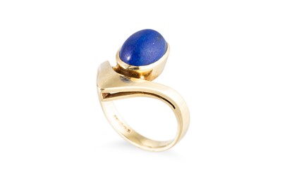 Lot 77 - A 1970S DESIGNER RING, set with lapis lazuli,...