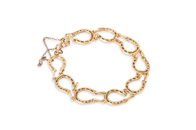 Lot 9 - A 9CT GOLD BRACELET OF HORSESHOE MOTIF LINKS,...