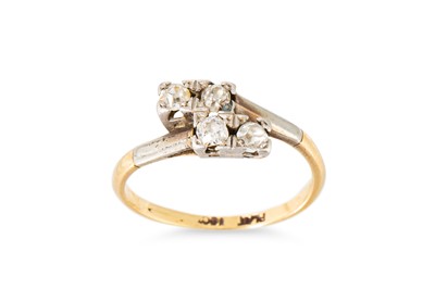 Lot 115 - A FOUR-STONE DIAMOND RING, of cross-over form,...