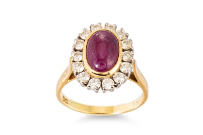 Lot 75 - A GEMSET AND DIAMOND SET RING, the oval...