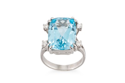 Lot 178 - A TOPAZ AND DIAMOND SET RING, mounted in 14ct...