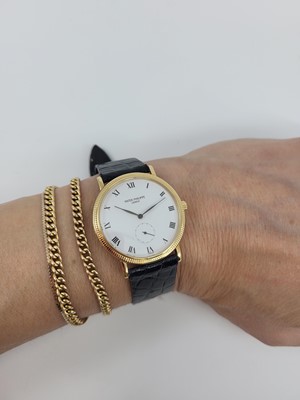 Lot 231 - A GENT'S VINTAGE PATEK PHILIPPE WRISTWATCH, in...