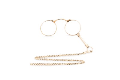Lot 148 - A 9CT GOLD CHAIN, suspending a rolled gold...