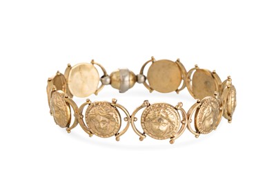Lot 3 - A 9CT YELLOW GOLD BRACELET, with nine...
