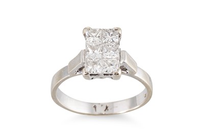 Lot 301 - A DIAMOND CLUSTER RING, the princess cut...