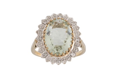 Lot 53 - A DIAMOND AND GREEN QUARTZ DRESS RING, the...