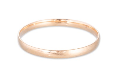 Lot 71 - A 9CT YELLOW GOLD BANGLE, 28.8 g., stamped 375