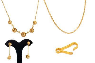 Lot 10 - A COLLECTION OF SOUTH AMERICAN YELLOW GOLD...