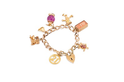 Lot 11 - A 9CT GOLD CHARM BRACELET, 42.5 g.