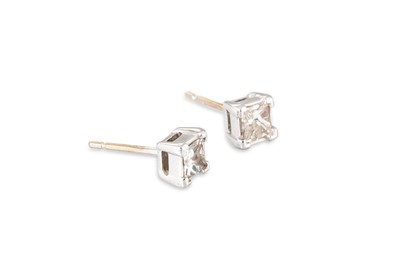 Lot 246 - A PAIR OF DIAMOND STUD EARRINGS, the princess...