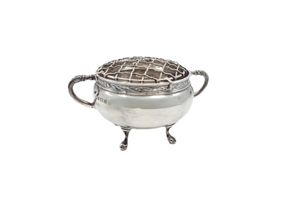 Lot 541 - A SMALL TWIN-HANDLED SILVER BOWL, with flower...