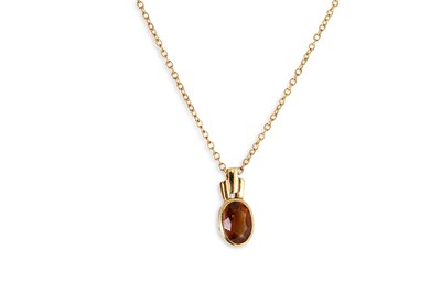 Lot 138 - A CITRINE PENDANT, mounted in 9ct yellow gold,...