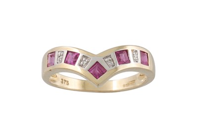 Lot 58 - A RUBY AND DIAMOND RING, v - shaped, mounted...
