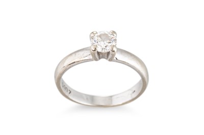 Lot 144 - A DIAMOND SOLITAIRE RING, mounted in 18ct gold....