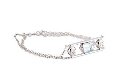 Lot 90 - A DIAMOND AND AQUAMARINE BRACELET, the central...