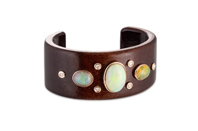 Lot 91 - AN UNUSUAL OPAL AND DIAMOND WOOD CUFF BANGLE,...