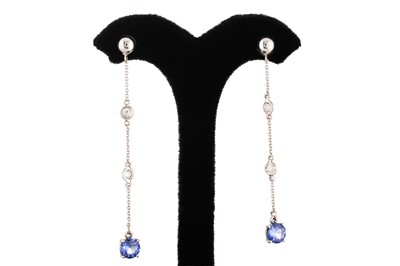 Lot 93 - A PAIR OF TANZANITE AND DIAMOND DROP EARRINGS,...