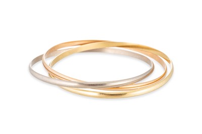 Lot 203 - A CARTIER TRINITY BANGLE, in three colour 18ct...