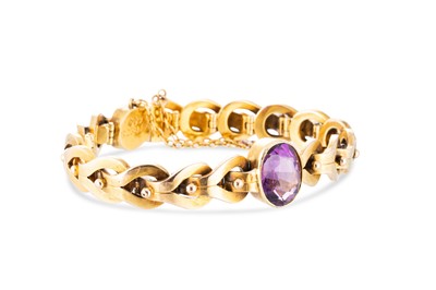 Lot 170 - AN  ANTIQUE AMETHYST SET BRACELET, the central...