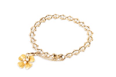 Lot 171 - AN ANTIQUE PEARL SET BRACELET, each fancy curb...