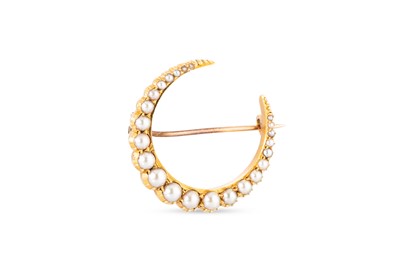 Lot 173 - AN ANTIQUE PEARL SET CRESCENT BROOCH, mounted...