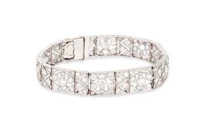 Lot 216 - AN ART DECO DIAMOND SET PANEL BRACELET, of...