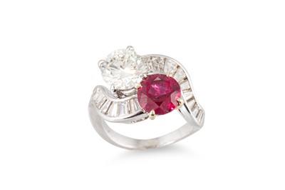 Lot 217 - A RUBY AND DIAMOND SET 'TOI ET MOI' RING, set...