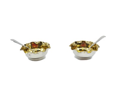 Lot 531 - A PAIR OF EDWARDIAN SILVER GILT SALTS,...