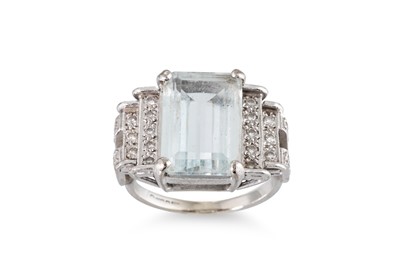 Lot 77 - A TOPAZ AND DIAMOND RING, the rectangular...