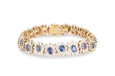 Lot 295 - A SAPPHIRE AND DIAMOND BRACELET, set with oval...