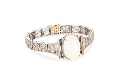 Lot 126 - AN OPAL AND DIAMOND BRACELET, the cabochon...