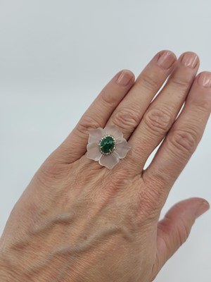 Lot 81 - AN ENAMEL, DIAMOND AND QUARTZ CRYSTAL RING,...