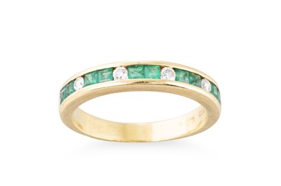 Lot 330 - AN EMERALD AND DIAMOND HALF HOOP RING, the...
