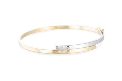 Lot 325 - A 9CT TWO COLOUR GOLD HINGED BANGLE, 4.6 g.