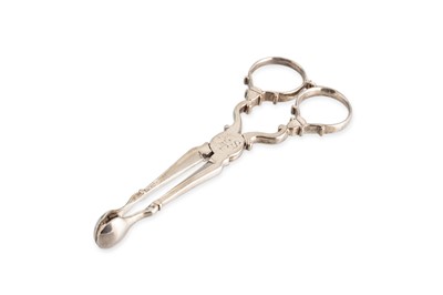 Lot 540 - A PAIR OF GEORGIAN ENGLISH SILVER SUGAR TONGS,...