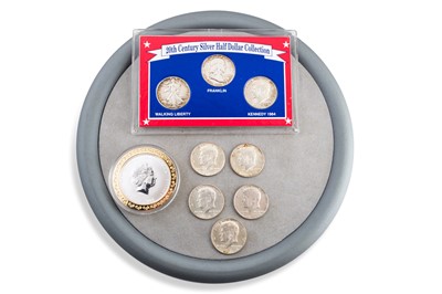 Lot 458 - A COLLECTION OF EIGHT US SILVER $½ COINS, a...