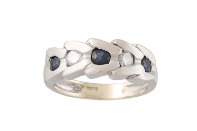 Lot 78 - A DIAMOND AND SAPPHIRE RING, set with three...