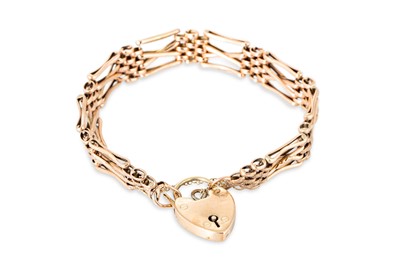 Lot 125 - A 9CT ROSE GOLD GATE BRACELET, with padlock...