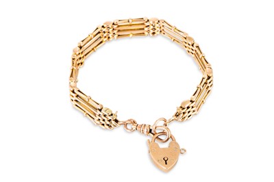 Lot 126 - A 9CT ROSE GOLD GATE BRACELET, with lobster...