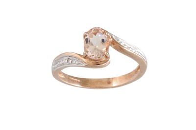 Lot 80 - A MORGANITE AND DIAMOND RING, the oval...