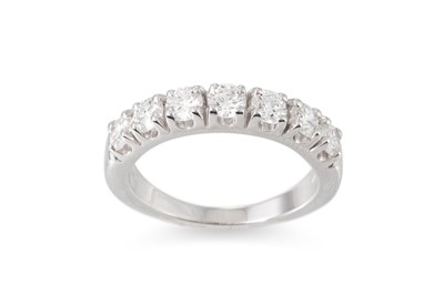 Lot 200 - A DIAMOND HALF ETERNITY RING, the round...